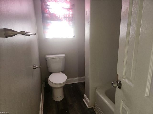 106 Clyde St, Hampton, VA 23669 - bathroom with toilet, a bathtub, wood finished floors, baseboards, and a shower