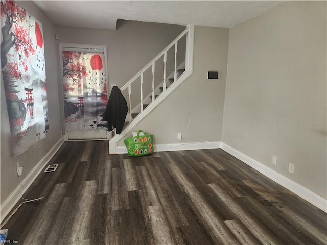 106 Clyde St, Hampton, VA 23669 - foyer entrance featuring stairs, wood finished floors, and baseboards