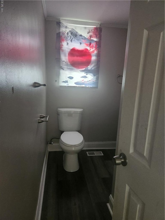 106 Clyde St, Hampton, VA 23669 - bathroom with ornamental molding, toilet, baseboards, and wood finished floors