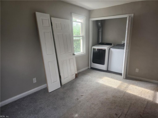 106 Clyde St, Hampton, VA 23669 - laundry area with independent washer and dryer, light carpet, and baseboards