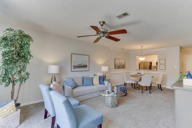 3857 Lasalle Dr Unit 102, Virginia Beach, VA 23453 - living room with light carpet, a ceiling fan, and baseboards