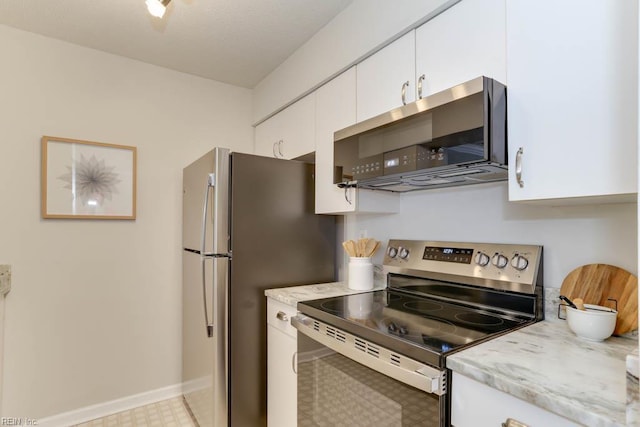 3857 Lasalle Dr Unit 102, Virginia Beach, VA 23453 - kitchen featuring stainless steel appliances, white cabinetry, baseboards, and light stone countertops