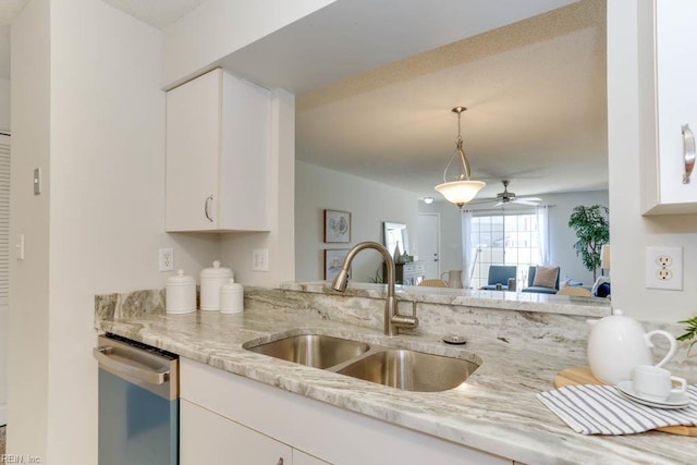 3857 Lasalle Dr Unit 102, Virginia Beach, VA 23453 - kitchen with a sink, stainless steel dishwasher, ceiling fan, white cabinetry, and light stone countertops
