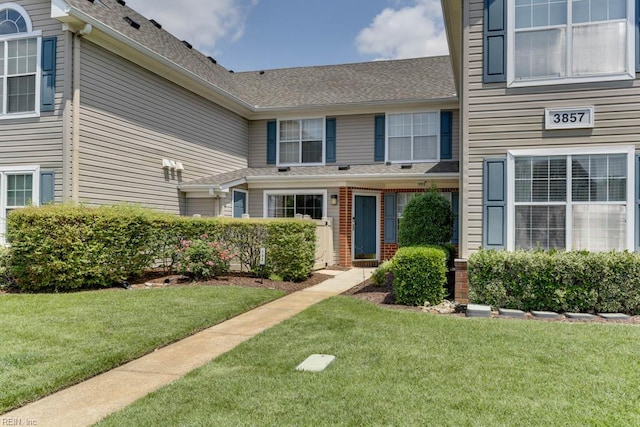 3857 Lasalle Dr Unit 102, Virginia Beach, VA 23453 - view of front of home with a front lawn and roof with shingles