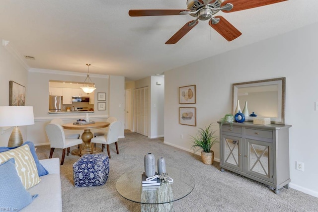 3857 Lasalle Dr Unit 102, Virginia Beach, VA 23453 - living area with light carpet, ceiling fan, baseboards, and ornamental molding
