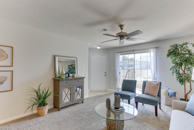 3857 Lasalle Dr Unit 102, Virginia Beach, VA 23453 - living room with carpet, ceiling fan, a textured ceiling, and baseboards