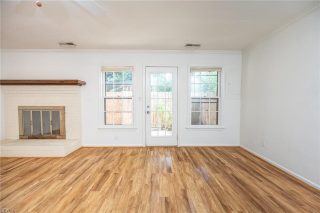 1217 Peoples Way, Virginia Beach, VA 23451 - unfurnished living room with wood finished floors, crown molding, baseboards, and plenty of natural light