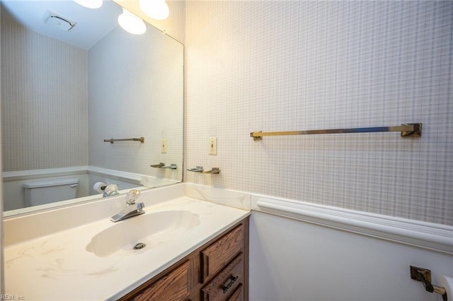 1217 Peoples Way, Virginia Beach, VA 23451 - bathroom featuring vanity, toilet, and wallpapered walls