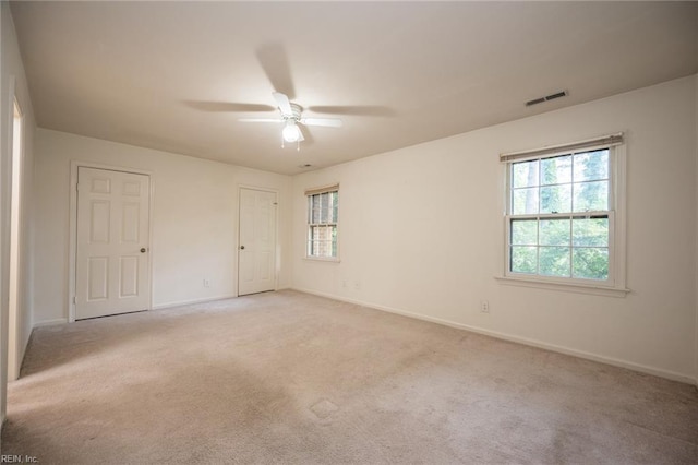 1217 Peoples Way, Virginia Beach, VA 23451 - unfurnished bedroom with baseboards, light carpet, and ceiling fan