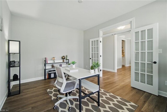 1028 Egret Ln, Suffolk, VA 23434 - office space with french doors, dark wood finished floors, and baseboards