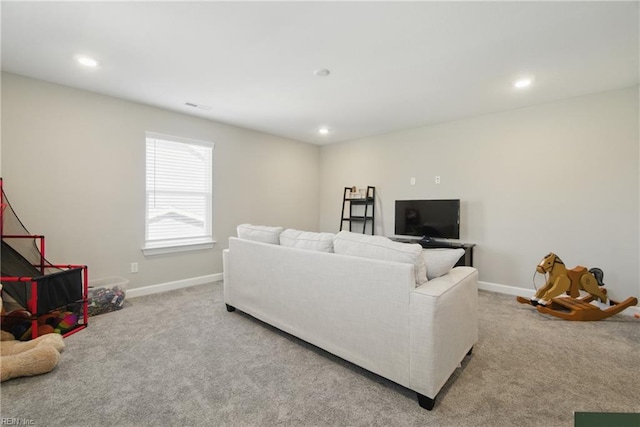 1028 Egret Ln, Suffolk, VA 23434 - living area featuring carpet, baseboards, and recessed lighting