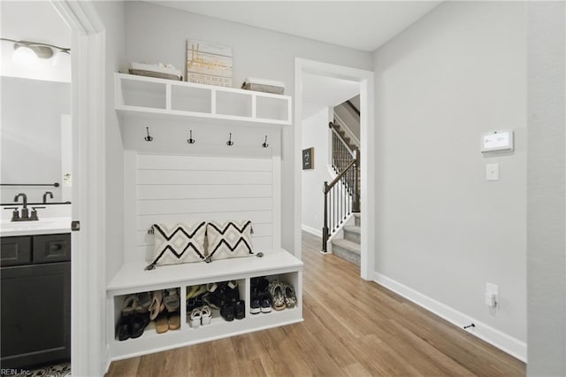 1028 Egret Ln, Suffolk, VA 23434 - mudroom with wood finished floors, baseboards, and a sink