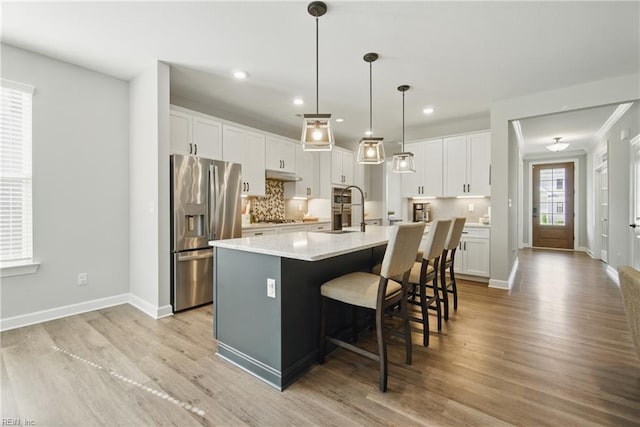 1028 Egret Ln, Suffolk, VA 23434 - kitchen featuring stainless steel appliances, a sink, tasteful backsplash, under cabinet range hood, and recessed lighting
