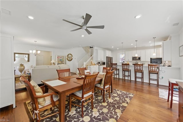 605 Middleton Way, Chesapeake, VA 23322 - dining room with stairs, healthy amount of natural light, ceiling fan, wood finished floors, and recessed lighting