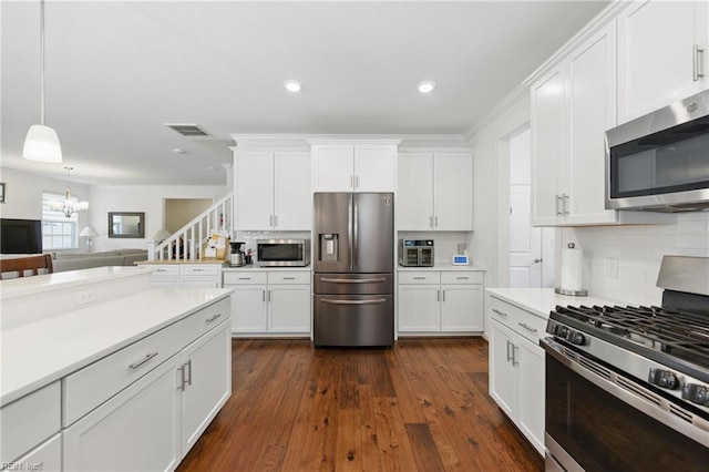 605 Middleton Way, Chesapeake, VA 23322 - kitchen with stainless steel appliances, white cabinetry, tasteful backsplash, and recessed lighting