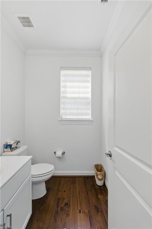 605 Middleton Way, Chesapeake, VA 23322 - half bathroom featuring wood finished floors, vanity, crown molding, toilet, and baseboards