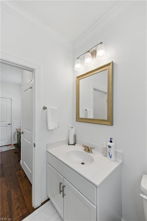 605 Middleton Way, Chesapeake, VA 23322 - bathroom featuring crown molding, vanity, wood finished floors, and toilet