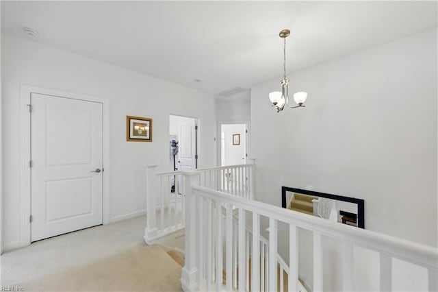 605 Middleton Way, Chesapeake, VA 23322 - hall featuring an upstairs landing, light colored carpet, a chandelier, and baseboards