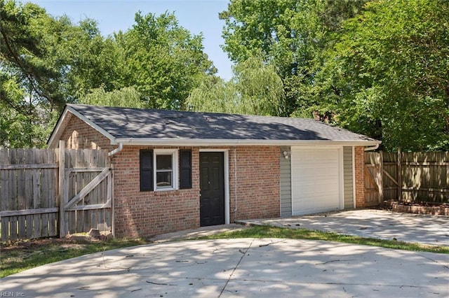 garage featuring driveway