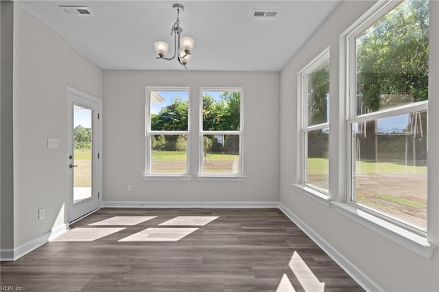 224 Preserve Way, Suffolk, VA 23434 - unfurnished dining area featuring a chandelier, wood finished floors, and baseboards