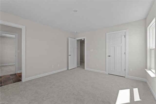 224 Preserve Way, Suffolk, VA 23434 - unfurnished bedroom with carpet flooring and baseboards