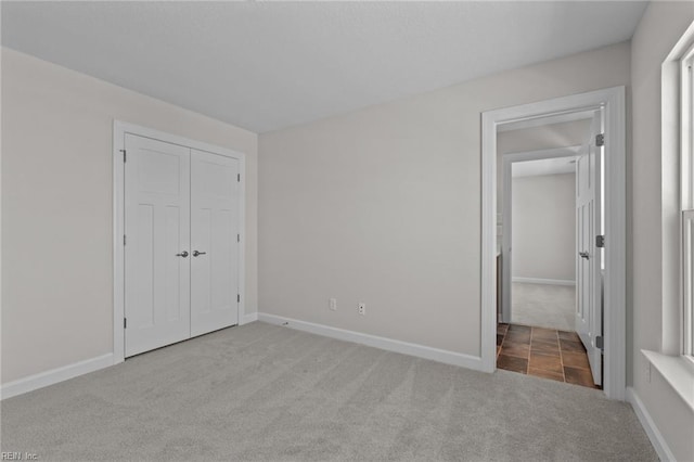 224 Preserve Way, Suffolk, VA 23434 - unfurnished bedroom with carpet, baseboards, and a closet