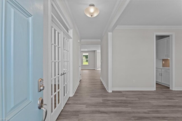 224 Preserve Way, Suffolk, VA 23434 - entryway with wood finished floors, ornamental molding, and baseboards