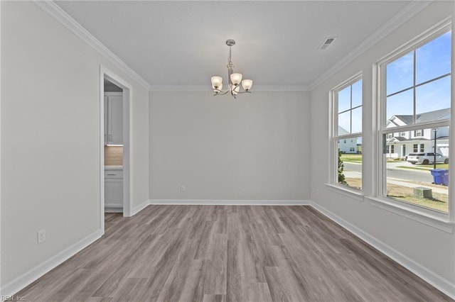 224 Preserve Way, Suffolk, VA 23434 - spare room with a chandelier, wood finished floors, crown molding, and baseboards