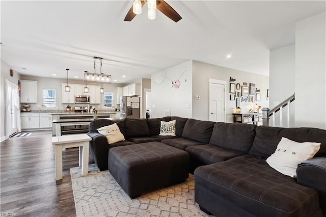 110 Sea Hero Ct, Suffolk, VA 23435 - living room featuring wood finished floors, ceiling fan, recessed lighting, and stairway