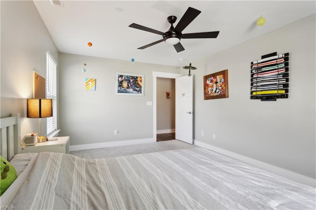 110 Sea Hero Ct, Suffolk, VA 23435 - bedroom with baseboards, light colored carpet, ceiling fan, and multiple windows