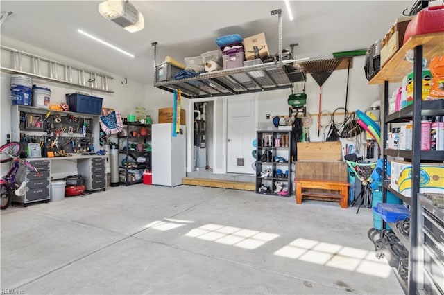 110 Sea Hero Ct, Suffolk, VA 23435 - garage featuring a garage door opener and a workshop area