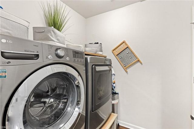 304 Michael Selby Dr, Hampton, VA 23666 - laundry area featuring washing machine and clothes dryer