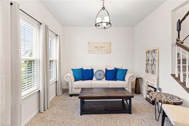 304 Michael Selby Dr, Hampton, VA 23666 - living room featuring stairs, healthy amount of natural light, and carpet