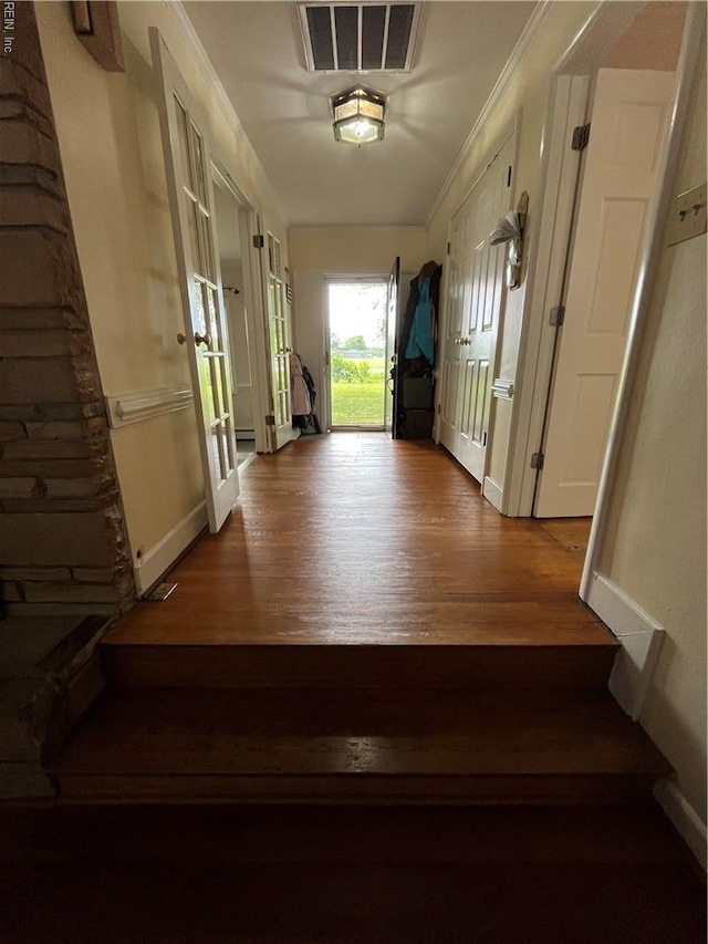 101 Stadium Dr, Chesapeake, VA 23322 - hall featuring wood finished floors, baseboards, and crown molding