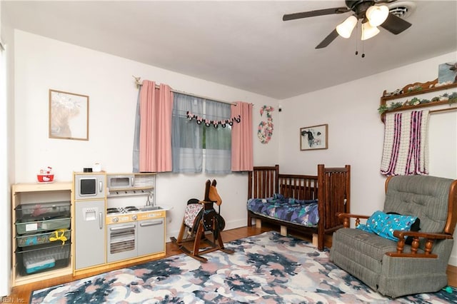 101 Stadium Dr, Chesapeake, VA 23322 - bedroom featuring wood finished floors and a ceiling fan
