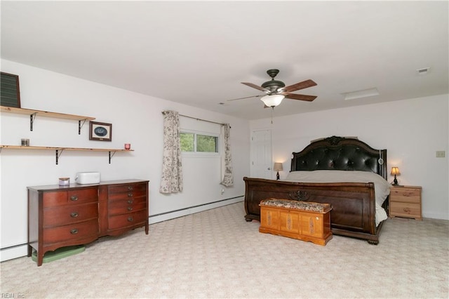 101 Stadium Dr, Chesapeake, VA 23322 - bedroom featuring a baseboard heating unit, carpet flooring, baseboards, and ceiling fan