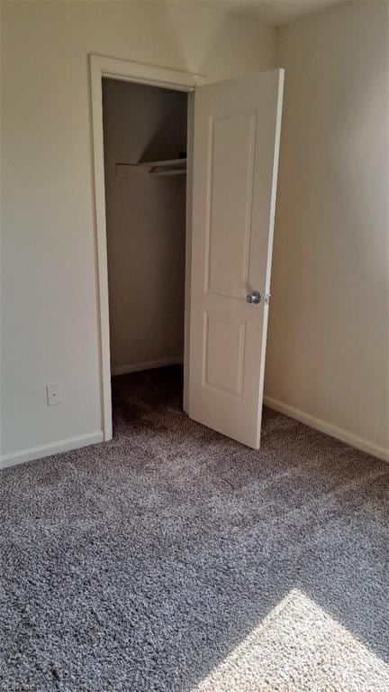 154 Jenness Ln Unit F, Newport News, VA 23602 - unfurnished bedroom featuring carpet flooring and a closet
