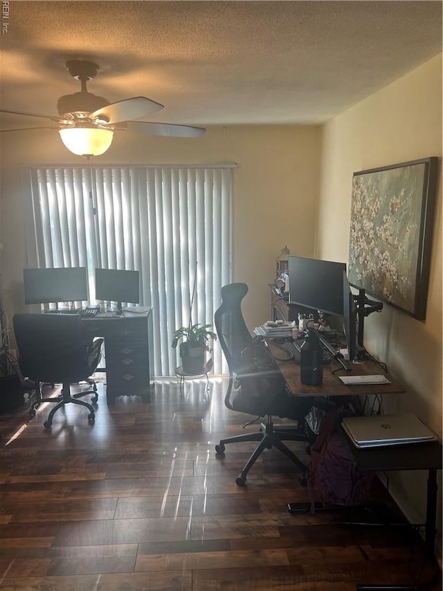 office featuring healthy amount of natural light, a textured ceiling, and ceiling fan