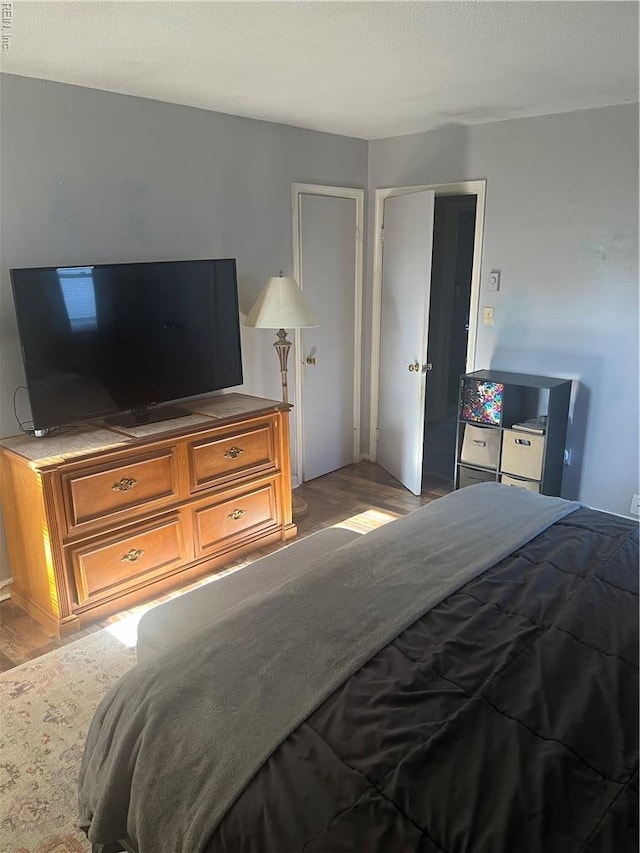 bedroom with light wood-style flooring