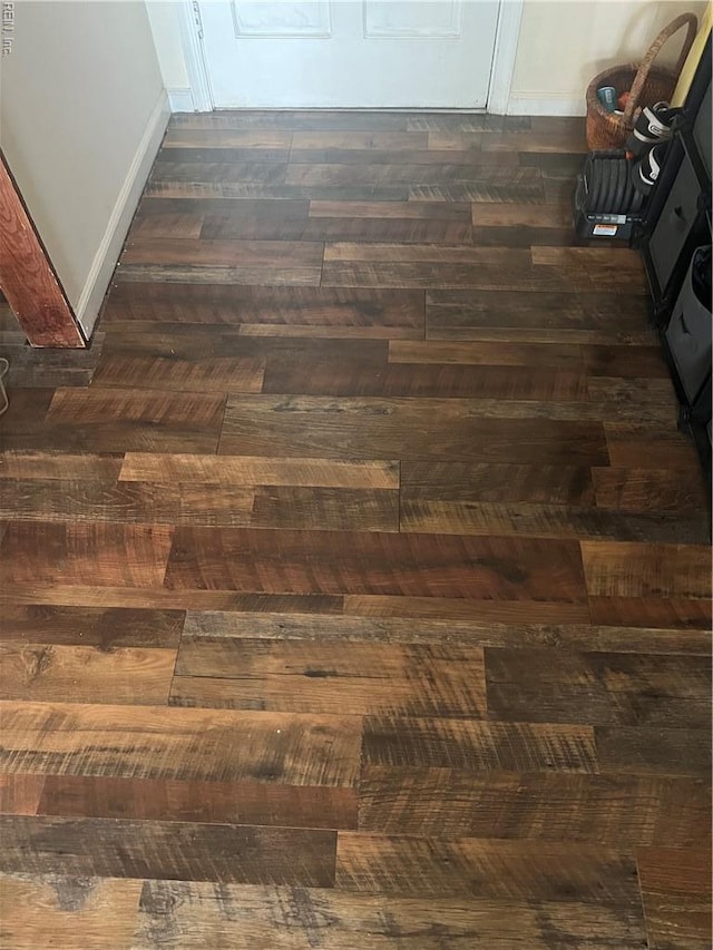 detailed view of wood finished floors and baseboards