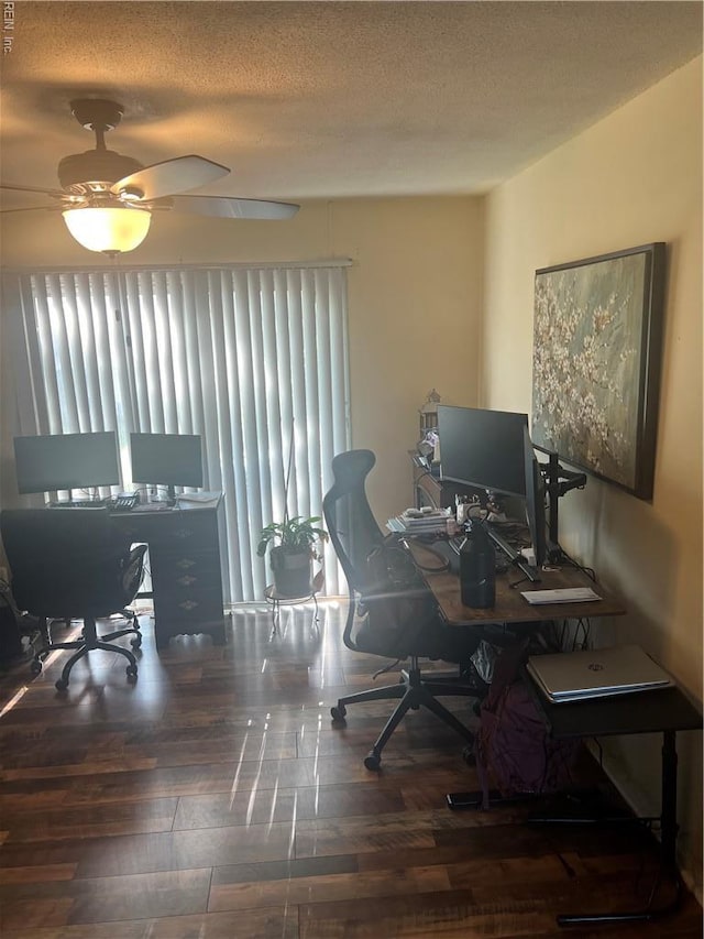 home office featuring a textured ceiling