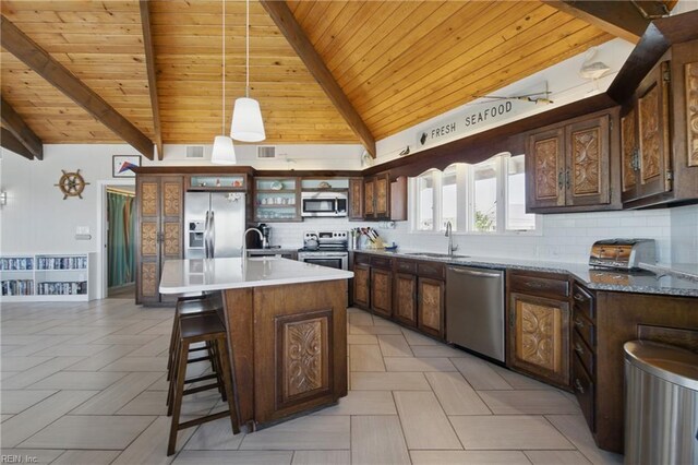 3616 Sandfiddler Rd, Virginia Beach, VA 23456 - kitchen with appliances with stainless steel finishes, wooden ceiling, a sink, backsplash, and pendant lighting