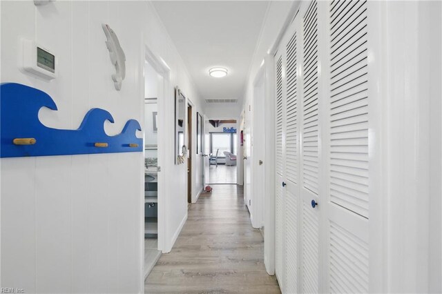 3616 Sandfiddler Rd, Virginia Beach, VA 23456 - hallway featuring light wood-type flooring