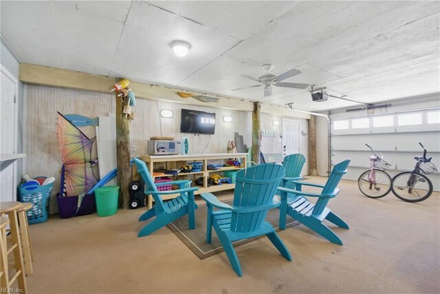 3616 Sandfiddler Rd, Virginia Beach, VA 23456 - recreation room with carpet floors, wood walls, and ceiling fan