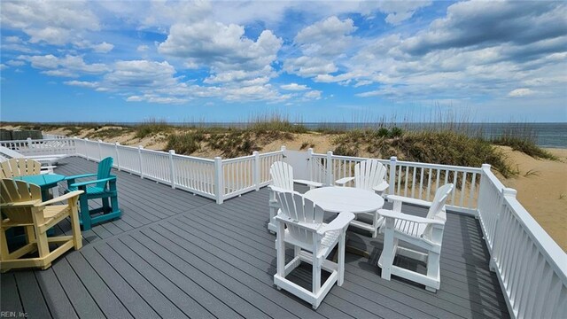 3616 Sandfiddler Rd, Virginia Beach, VA 23456 - deck with view of water and beach and outdoor dining space