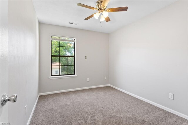 1048 Wilmington St, Norfolk, VA 23505 - empty room featuring carpet, a ceiling fan, and baseboards