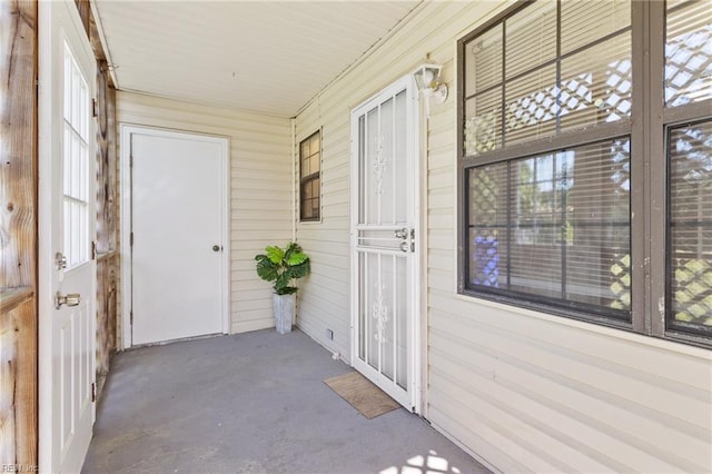 1048 Wilmington St, Norfolk, VA 23505 - doorway to property with covered porch