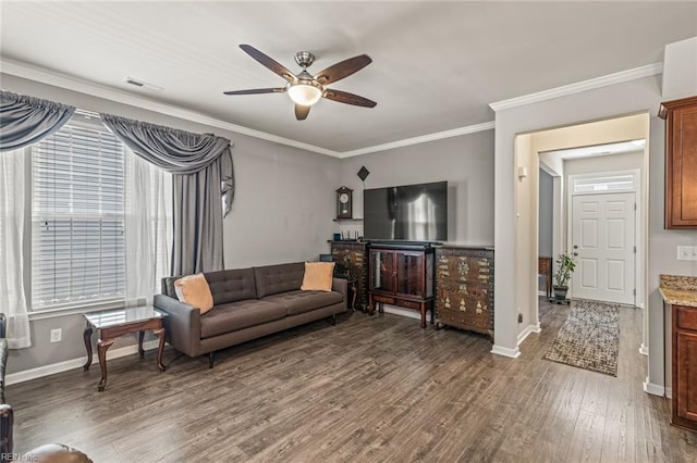 513 Simpson Ln, Chesapeake, VA 23323 - living area featuring wood finished floors, ceiling fan, baseboards, and ornamental molding