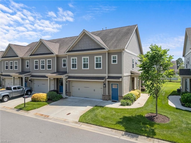 149 Repose Ln, Chesapeake, VA 23320 - townhome / multi-family property featuring a garage, a front lawn, driveway, central AC unit, and roof with shingles