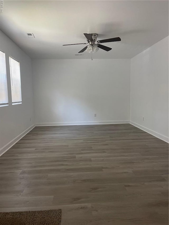 712 Norfleet St, Franklin, VA 23851 - spare room with baseboards, a ceiling fan, and wood finished floors
